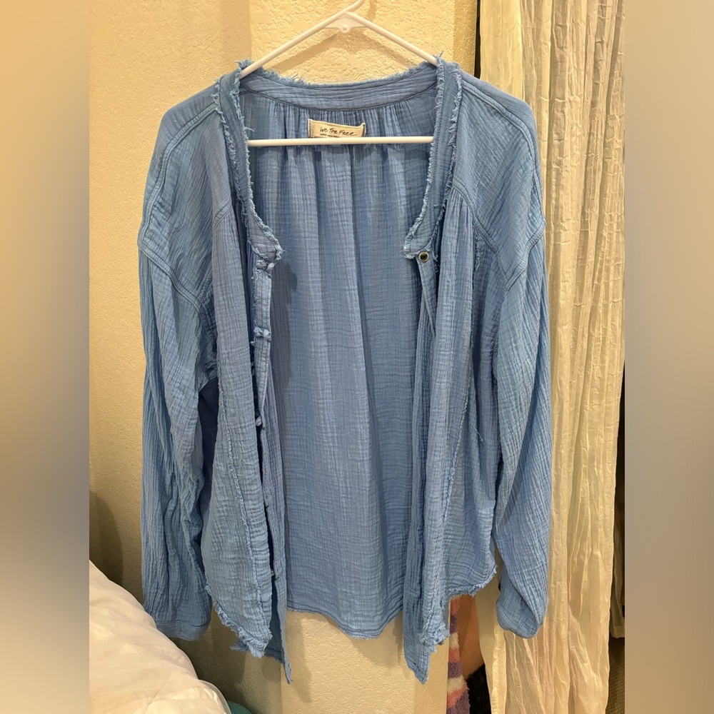 We the free moving mountains button down top